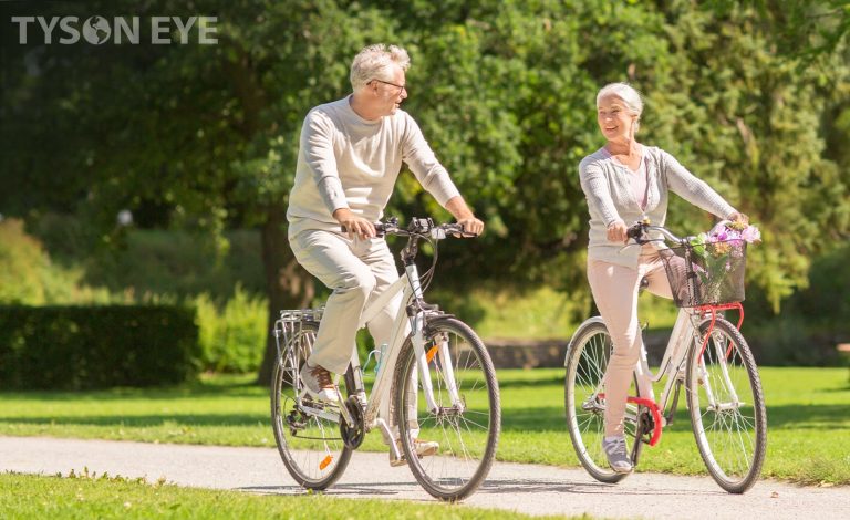 Couple riding bikes and understanding the age related vision problems