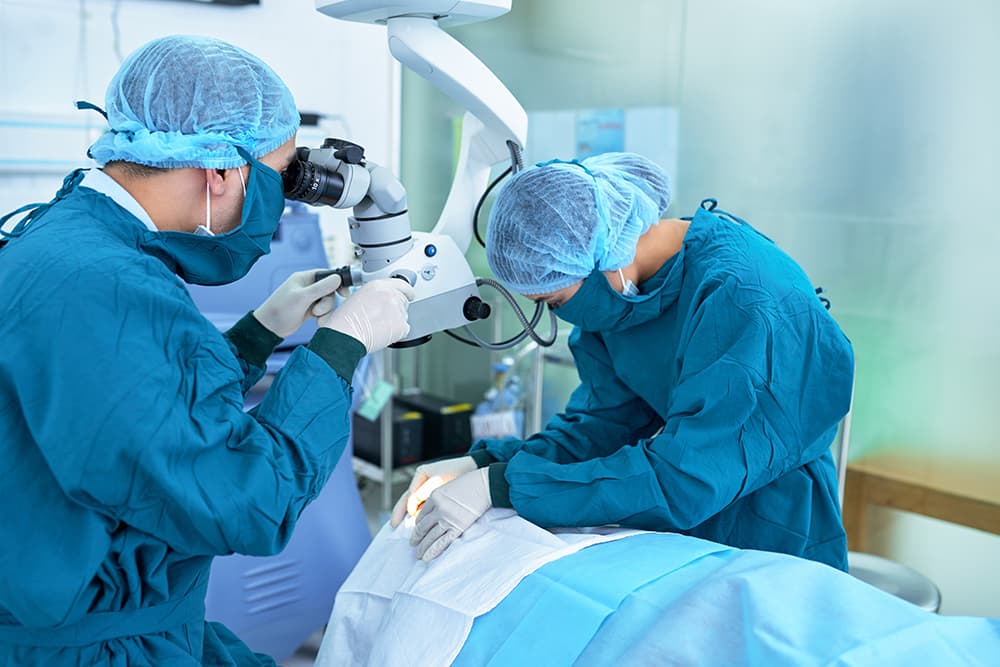A group of eye doctors performing cataract surgery