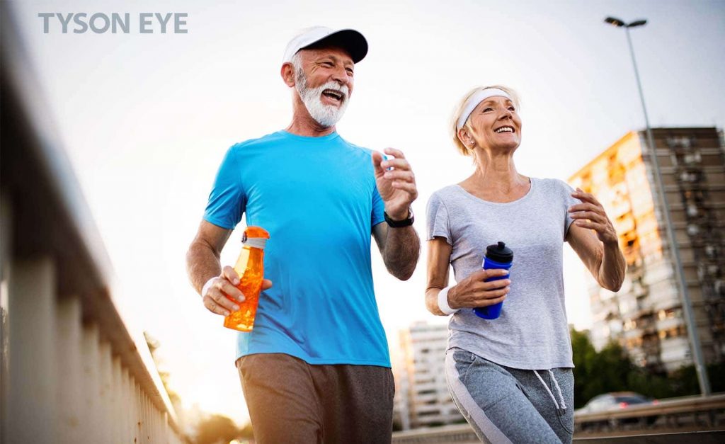 a couple jogging together and showing the common retina disorders