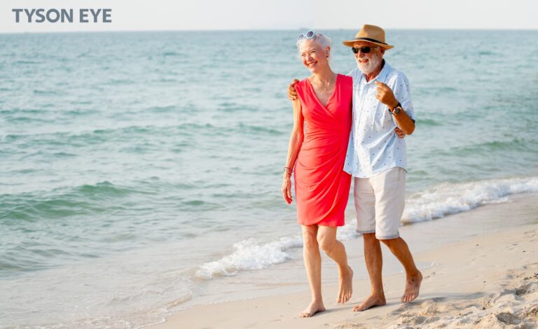 Two people walking down the beach and showcasing Summer Eye care tips