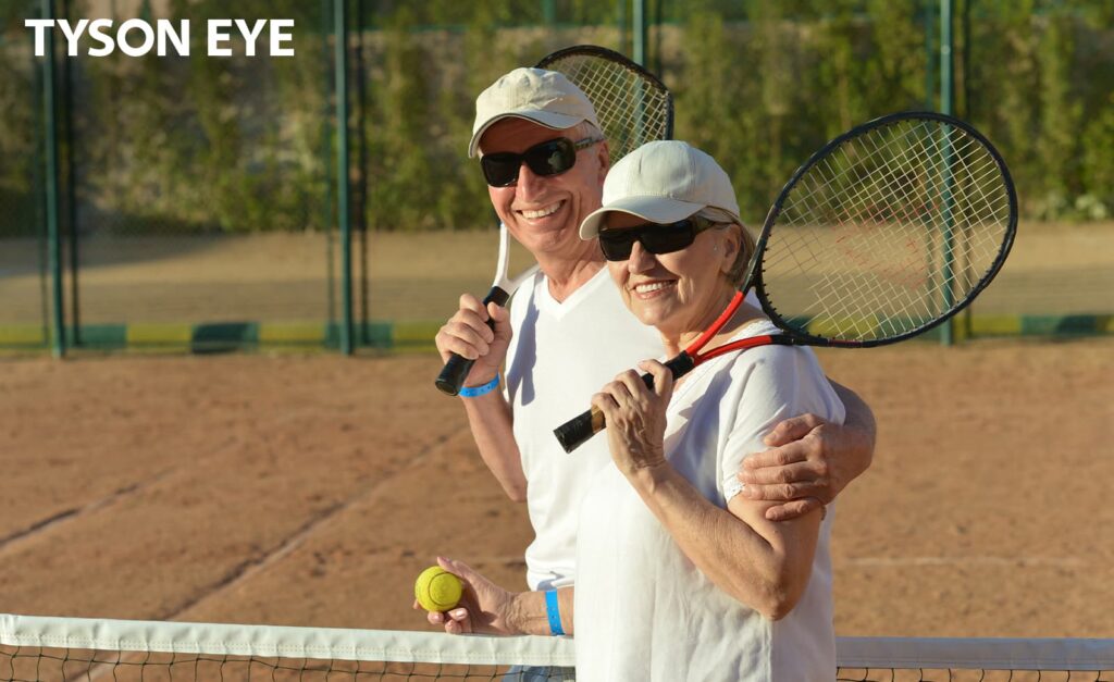 Two people playing tennis while wearing the right pair of glasses for your lifestyle